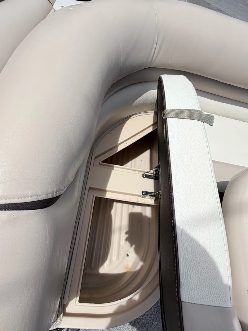 Slide: The Image of Seat storage compartment on 2016 Sun Tracker Party Barge 22 DLX. - 26