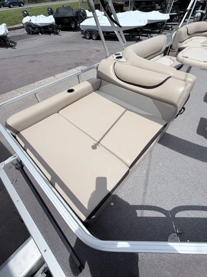 Slide: The Image of 2016 Sun Tracker Party Barge 22 DLX lounge area on pontoon boat. - 3