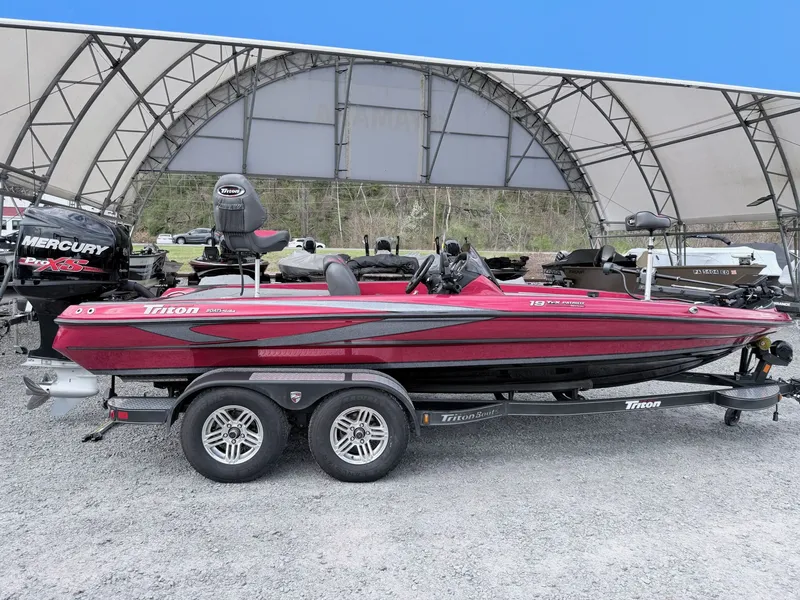 The Image of 2017 Triton 19 TrX boat on trailer, side view. - 1