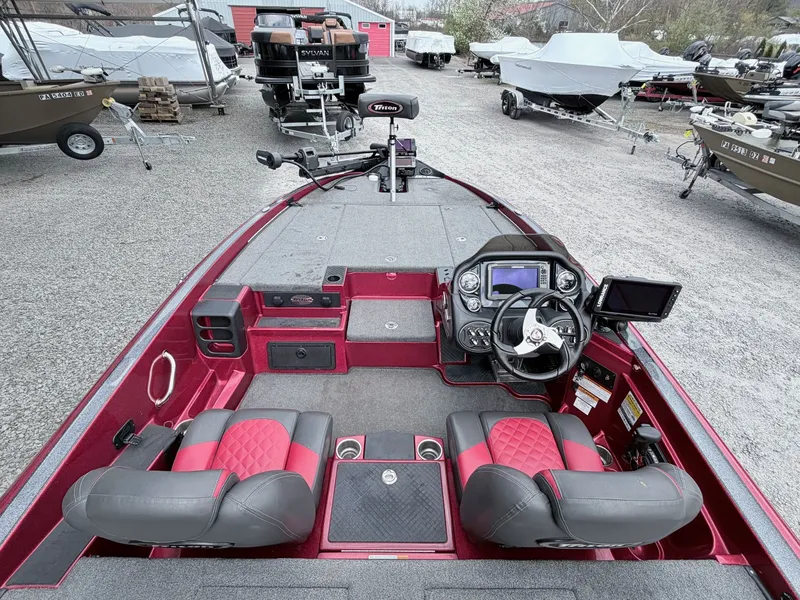 Slide: The Image of Interior of a 2017 Triton 19 TrX boat with steering console. - 20