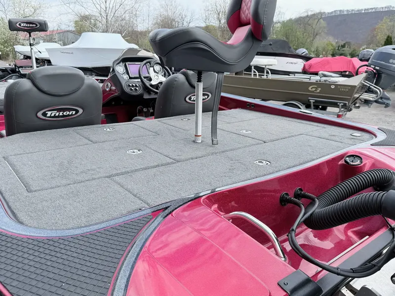 Slide: The Image of 2017 Triton 19 TrX boat with gray deck and seat. - 31