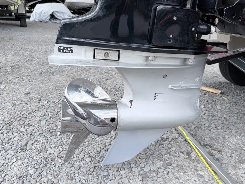 Slide: The Image of 2017 Triton 19 TrX boat motor with propeller on gravel. - 45