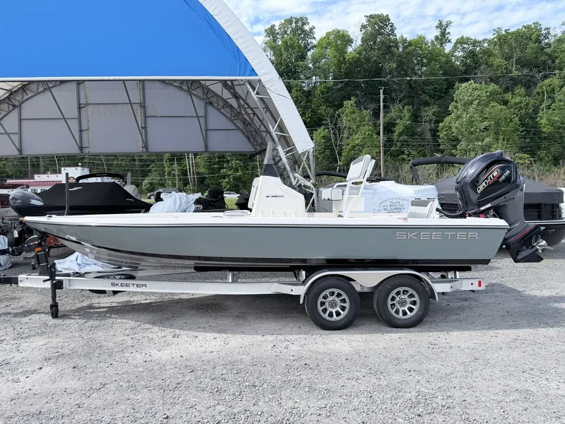 The Image of 2026 Skeeter SX221 boat parked on trailer outdoors. - 1