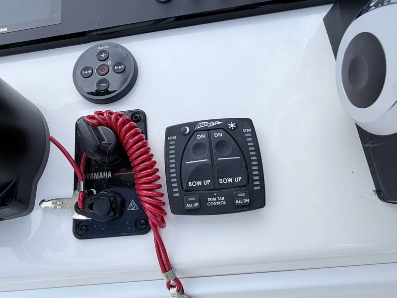 Slide: The Image of Control panel of a 2026 Skeeter SX221 boat. - 20