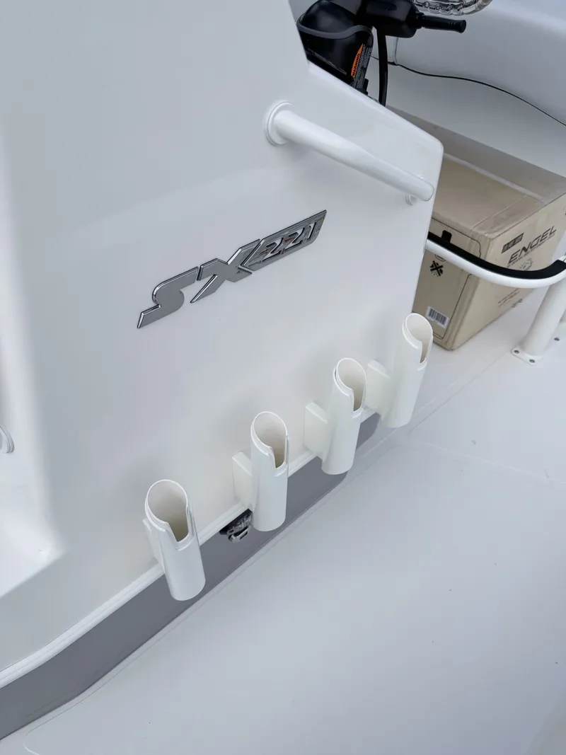 Slide: The Image of 2026 Skeeter SX221 boat with fishing rod holders. - 21