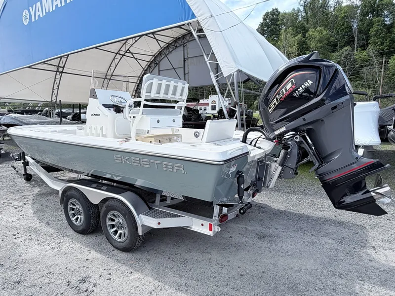Slide: The Image of 2026 Skeeter SX221 boat with Yamaha engine on trailer. - 23