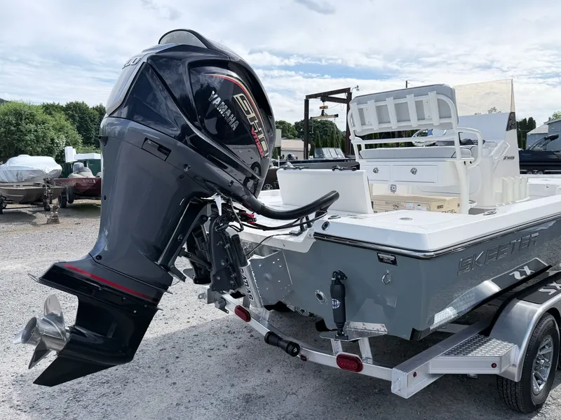 Slide: The Image of 2026 Skeeter SX221 boat with Yamaha outboard motor. - 32