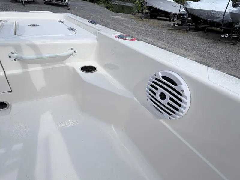 Slide: The Image of Interior of Skeeter SX221 boat, featuring speaker and grab handle. - 34