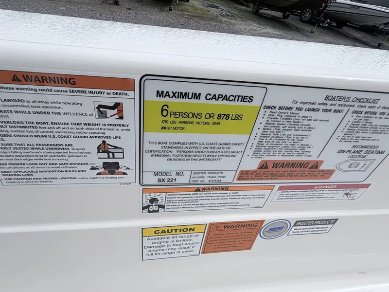 Slide: The Image of Skeeter SX221 2026 boat capacity: 6 persons or 878 lbs. - 37