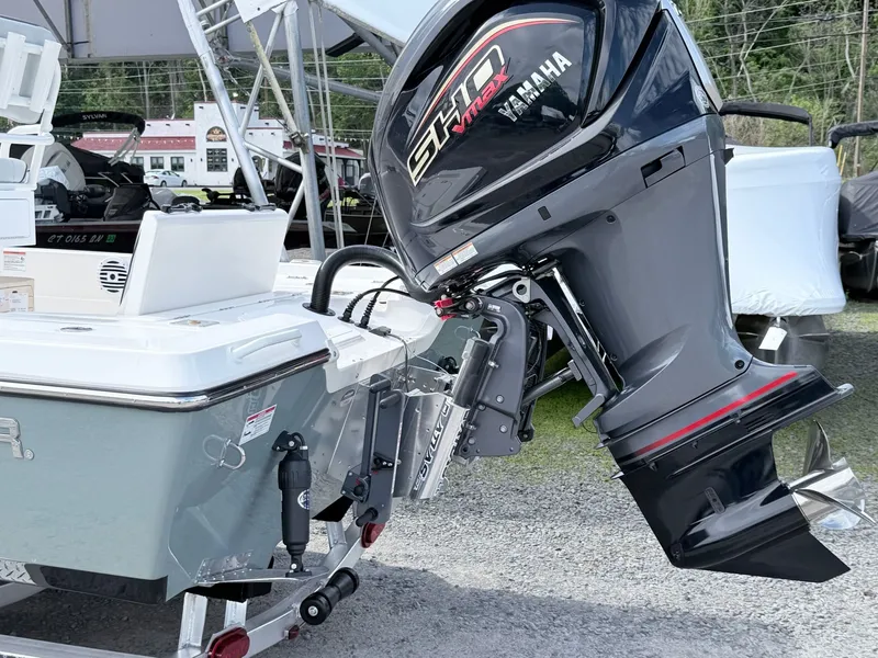 Slide: The Image of Skeeter SX221 2026 with Yamaha outboard motor on boat trailer. - 4