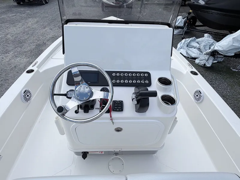 Slide: The Image of Steering console of the 2026 Skeeter SX221 boat. - 40