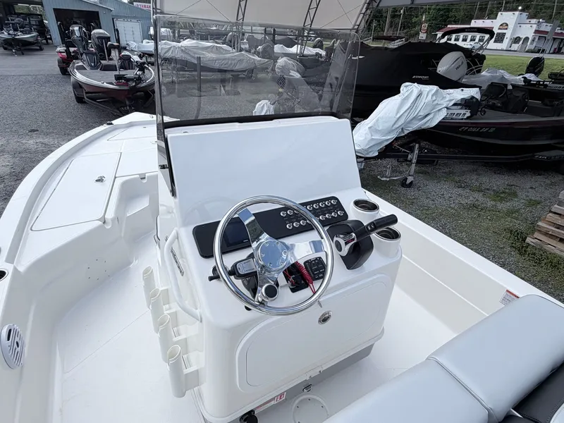 Slide: The Image of Interior view of 2026 Skeeter SX221 boat with steering console. - 42