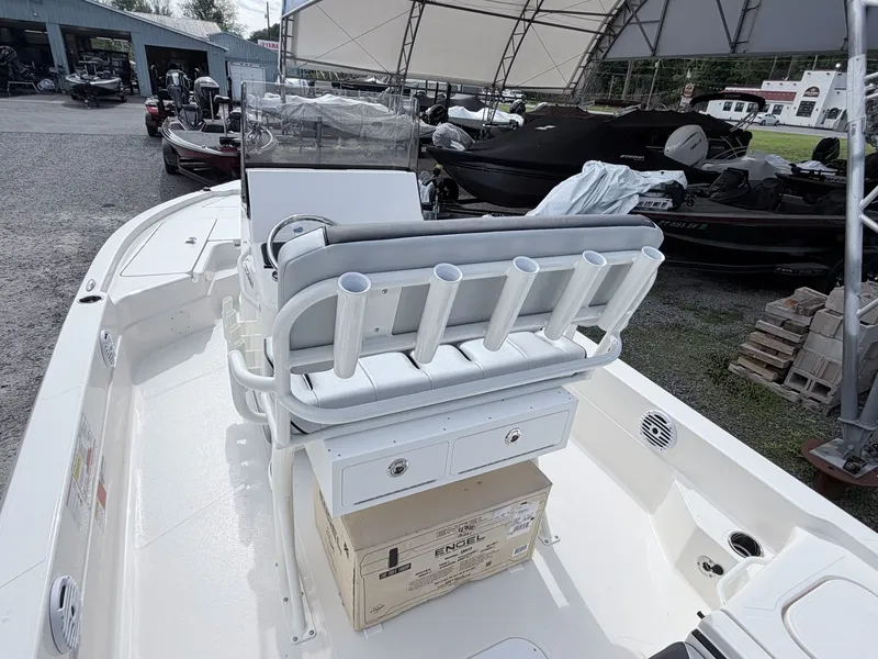 Slide: The Image of 2026 Skeeter SX221 boat with fishing rod holders and storage. - 44