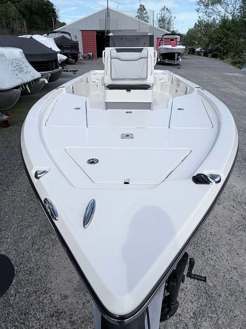 Slide: The Image of 2026 Skeeter SX221 boat on a lot, front view. - 49