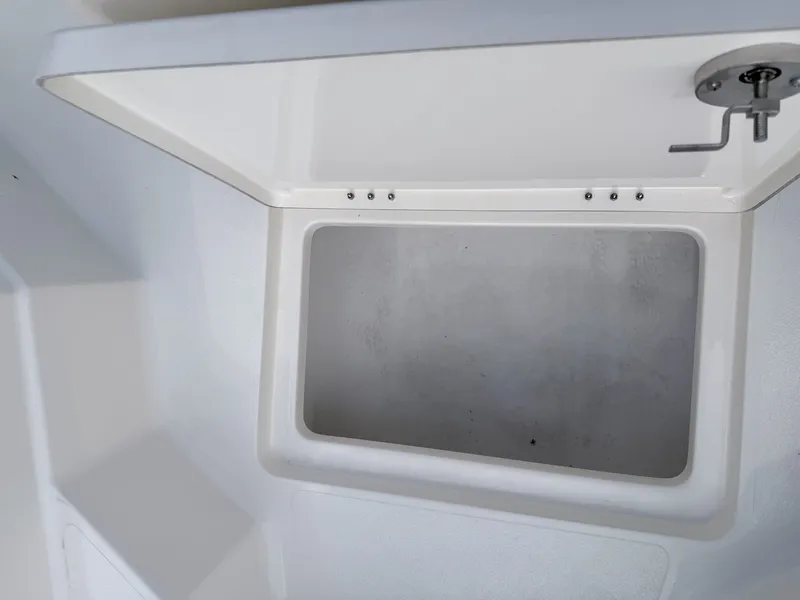 Slide: The Image of Interior view of Skeeter SX221 2026 boat compartment. - 6