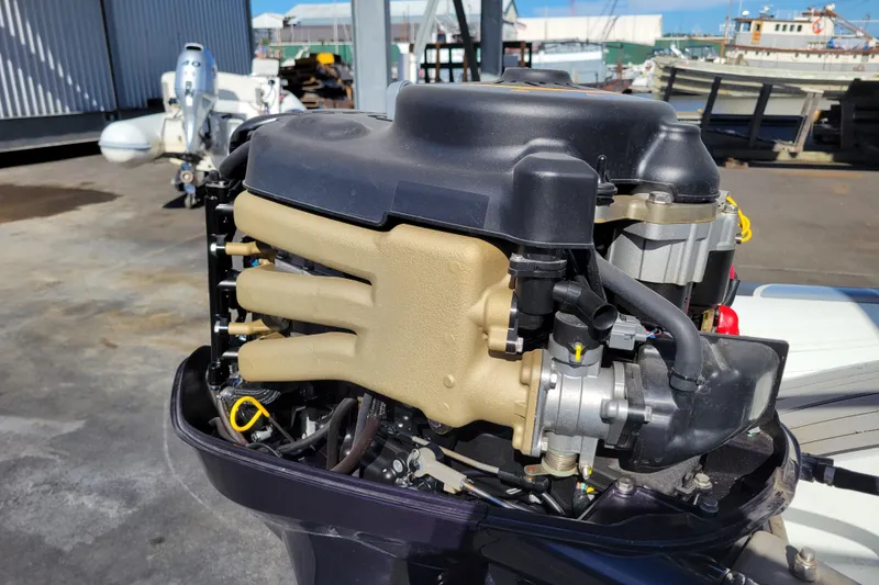 Slide: The Image of Outboard motor of a 2022 Highfield Sport 460 boat, detailed view. - 24