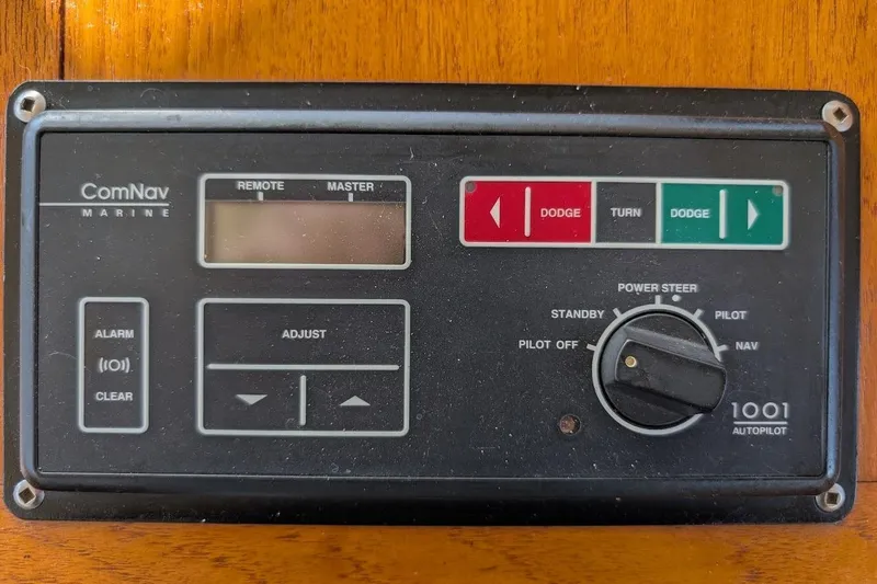 Slide: The Image of ComNav Marine autopilot control panel on 1979 Grand Banks 42 Classic yacht. - 38