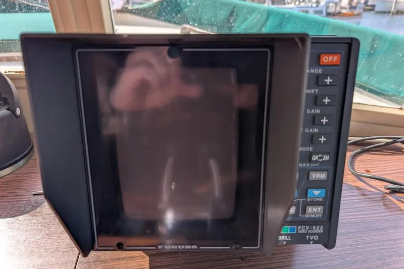 Slide: The Image of Furuno FCV-522 sonar display on 1979 Grand Banks 42 Classic boat dashboard. - 41