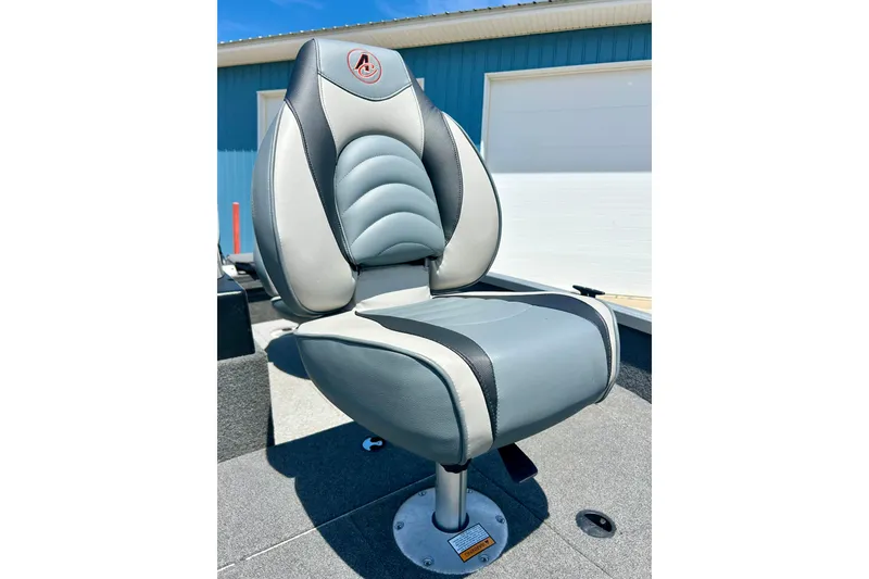 Slide: The Image of 2019 Alumacraft Classic 165 Sport boat seat, gray and black, outdoors. - 18