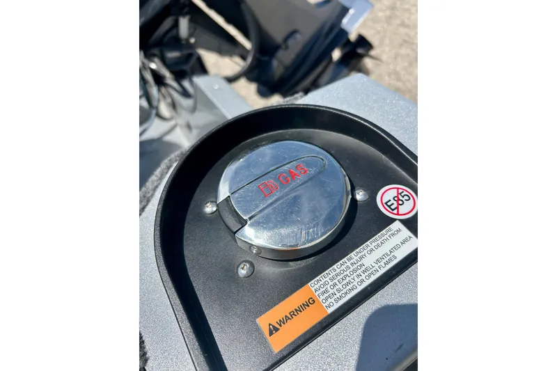 Slide: The Image of Fuel cap of 2019 Alumacraft Classic 165 Sport boat with E5 warning label. - 21