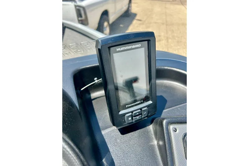 Slide: The Image of Humminbird PiranhaMax 4 fish finder on 2019 Alumacraft Classic 165 Sport boat dashboard. - 30