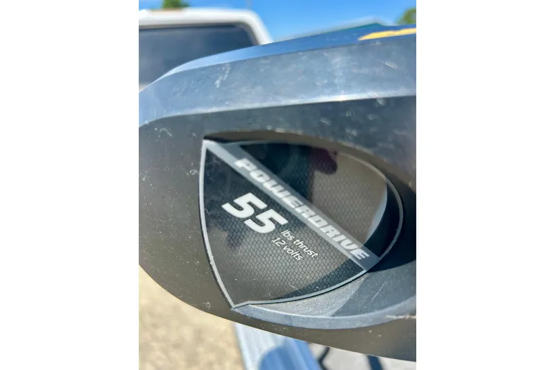 Slide: The Image of Close-up of a 2019 Alumacraft Classic 165 Sport motor, showing "PowerDrive 55 lbs thrust, 12 volts." - 31