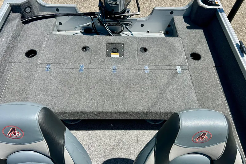 Slide: The Image of 2019 Alumacraft Classic 165 Sport boat interior with Yamaha motor and seating. - 34