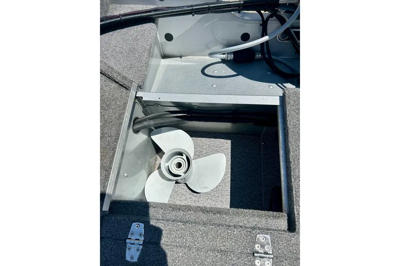 Slide: The Image of 2019 Alumacraft Classic 165 Sport boat interior with propeller compartment. - 35
