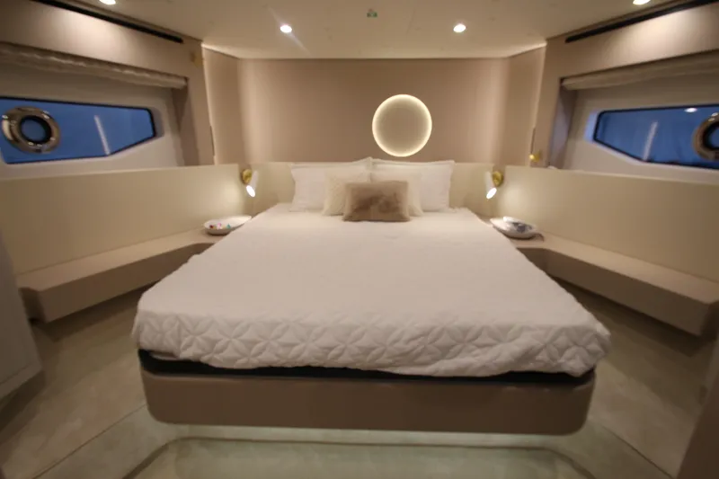 Slide: The Image of Luxurious bedroom interior of 2023 Azimut Fly 68 yacht with modern design and ambient lighting. - 50
