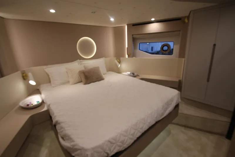 Slide: The Image of Luxurious bedroom interior of 2023 Azimut Fly 68 yacht with modern design and ambient lighting. - 51