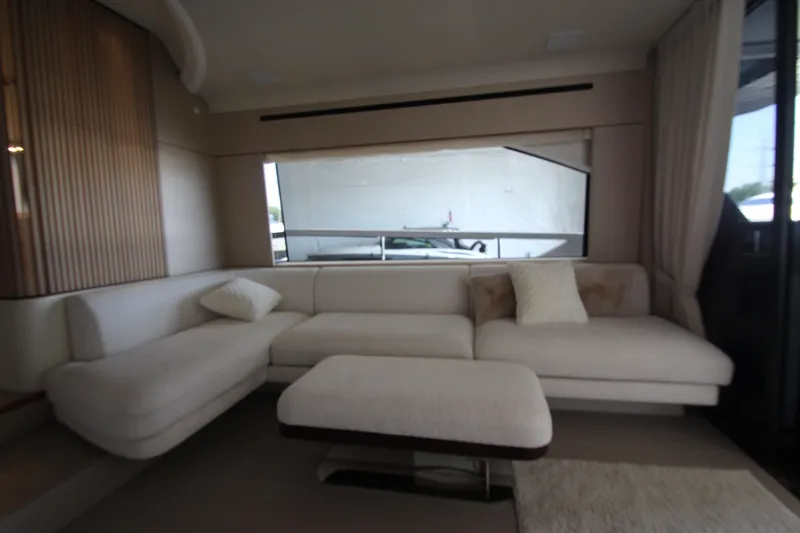 Slide: The Image of Luxurious interior of 2023 Azimut Fly 68 yacht with elegant white seating. - 16