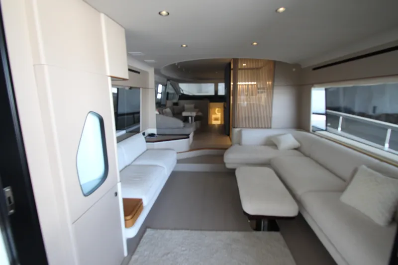 Slide: The Image of Luxurious interior of 2023 Azimut Fly 68 yacht with modern seating and elegant design. - 13