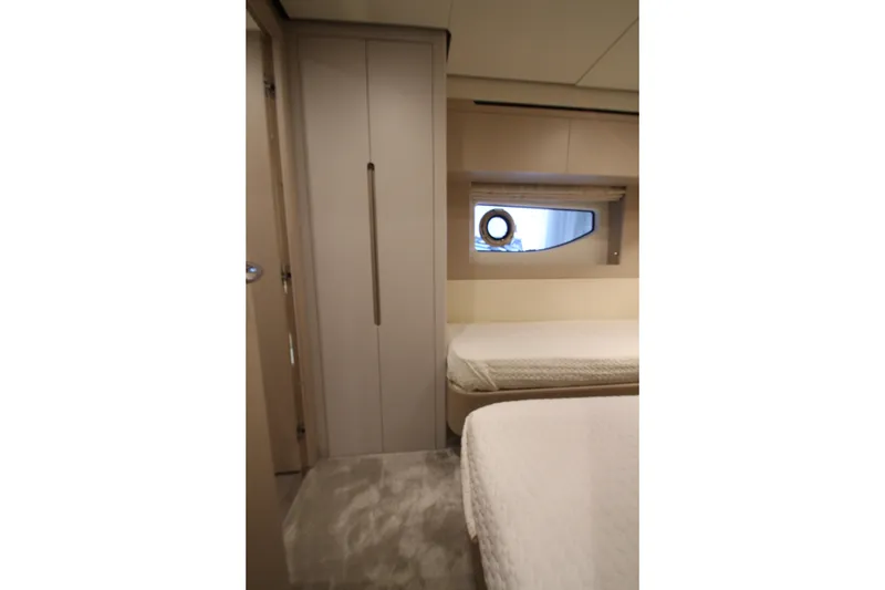 Slide: The Image of Luxurious interior of 2023 Azimut Fly 68 yacht cabin with modern design. - 41