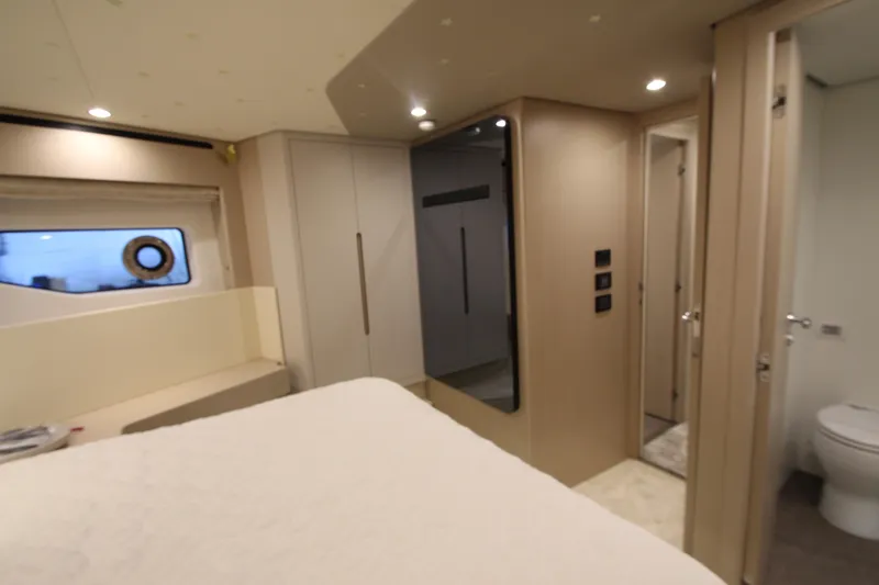 Slide: The Image of Luxurious interior of 2023 Azimut Fly 68 yacht, featuring modern design and elegant furnishings. - 53