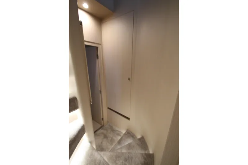 Slide: The Image of Staircase interior of 2023 Azimut Fly 68 yacht, featuring modern design and lighting. - 59