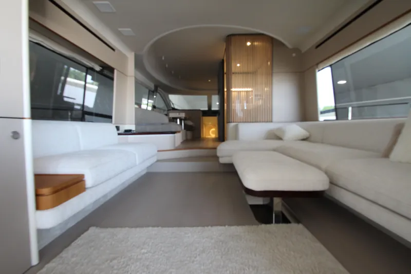 Slide: The Image of Luxurious interior of 2023 Azimut Fly 68 yacht with modern seating and elegant design. - 14