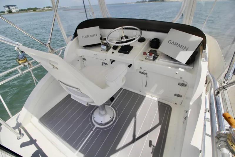 Slide: The Image of Cockpit of a 1970 Bertram 31 Sportfisher with Garmin navigation equipment. - 6