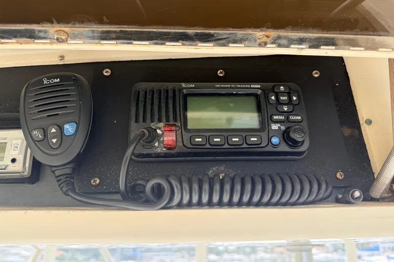 Slide: The Image of VHF marine radio on 1986 Viking 35 Convertible boat dashboard. - 25