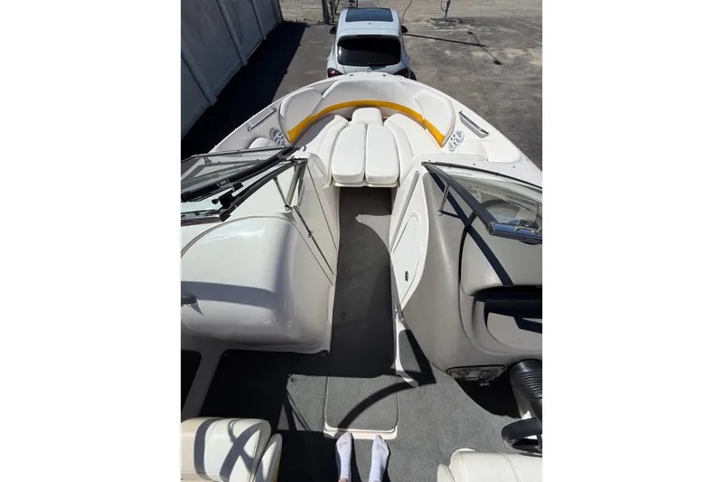 Slide: The Image of 2007 Regal 2400 Bowrider interior view with seating and dashboard. - 13