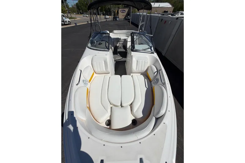 Slide: The Image of 2007 Regal 2400 Bowrider boat with spacious seating and sleek design. - 15