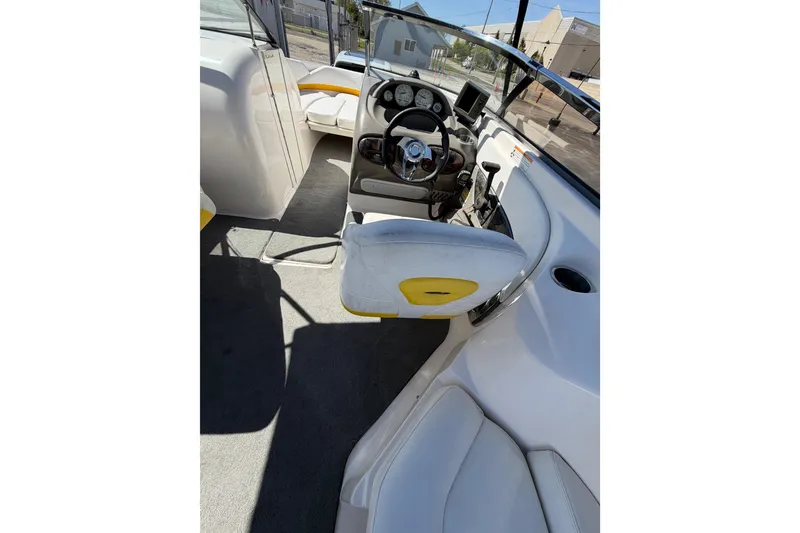 Slide: The Image of 2007 Regal 2400 Bowrider interior with steering wheel and seating, showcasing modern design. - 20