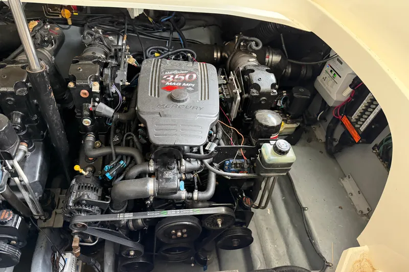 Slide: The Image of Engine compartment of a 2003 Sea Ray 290 Bowrider with MerCruiser 350 MAG MPI engine. - 31