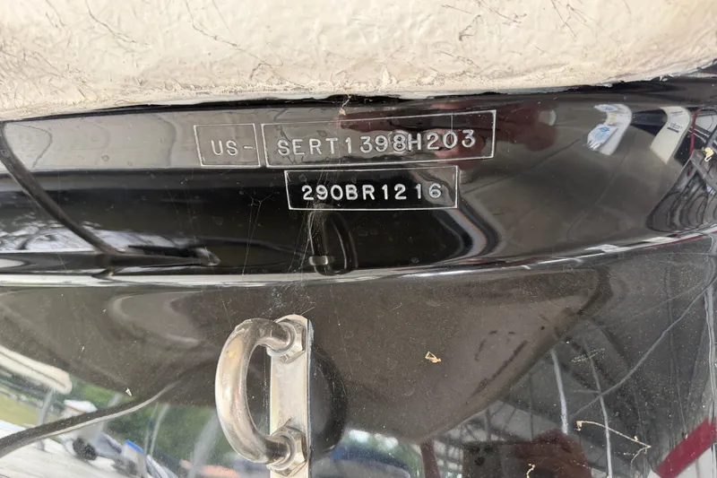 Slide: The Image of 2003 Sea Ray 290 Bowrider boat identification number on hull. - 33