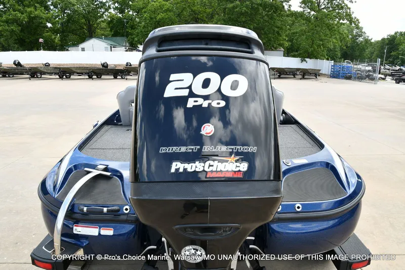 Slide: The Image of 2018 Nitro Z19 Pro boat with 200 HP engine on parking lot. - 27