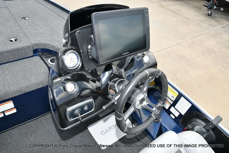 Slide: The Image of Nitro Z19 Pro 2018 boat console with Garmin display and steering wheel. - 48