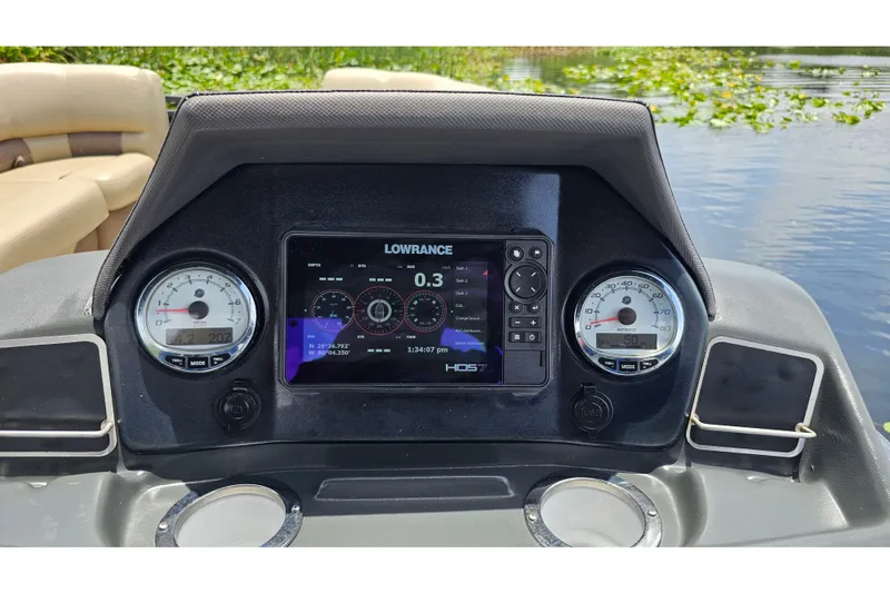 Slide: The Image of Dashboard of 2020 Regency 230 LE3 boat with Lowrance HDS7 display. - 57