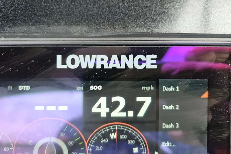 Slide: The Image of Lowrance display showing speed of 42.7 mph on Regency 230 LE3, 2020 model. - 60