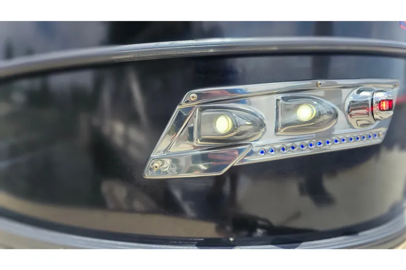 Slide: The Image of 2020 Regency 230 LE3 boat with sleek LED lighting detail. - 62