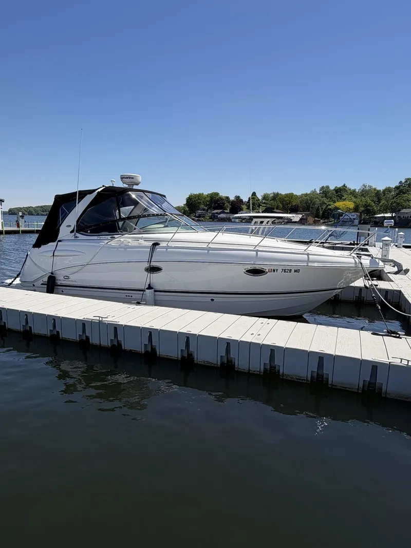 The Image of 2006 Chaparral Signature boat docked on a sunny day. - 1