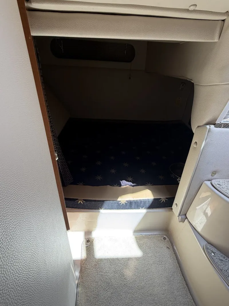 Slide: The Image of Interior of a 2006 Chaparral Signature yacht with sleeping area. - 10